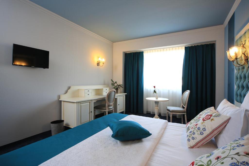 Simfonia Boutique Hotel Ramnicu Valcea Room photo